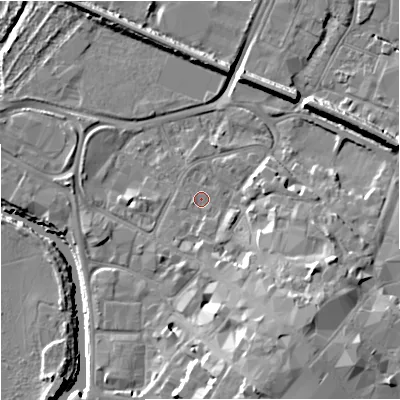 Shaded relief map of the ground around GL12QT, computed from Environment Agency LiDAR. The ground here sits at about 11 m above sea level and falls 15 m across the surrounding 800 m. Surface water reaching this point runs off ground lying to the south-south-east, 1.1 m higher.