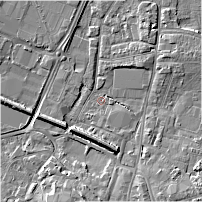 Shaded relief map of the ground around GL12QW, computed from Environment Agency LiDAR. The ground here sits at about 11 m above sea level and falls 9 m across the surrounding 800 m. Surface water reaching this point runs off ground lying to the south-south-east, 8.2 m higher.