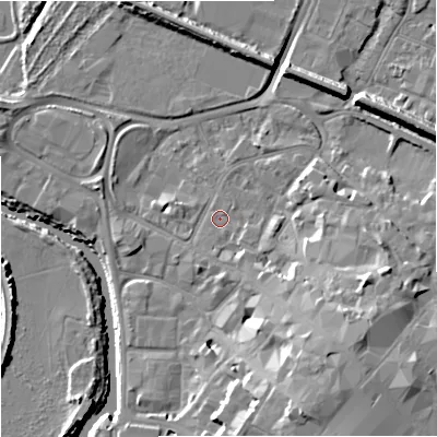 Shaded relief map of the ground around GL12QY, computed from Environment Agency LiDAR. The ground here sits at about 11 m above sea level and falls 15 m across the surrounding 800 m. Surface water reaching this point runs off ground lying to the south-south-east, 1.9 m higher.