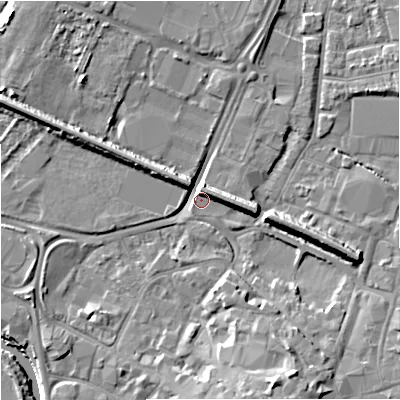 Shaded relief map of the ground around GL12RQ, computed from Environment Agency LiDAR. The ground here sits at about 10 m above sea level and falls 13 m across the surrounding 800 m. Surface water reaching this point runs off ground lying to the south-south-east, 11.1 m higher.