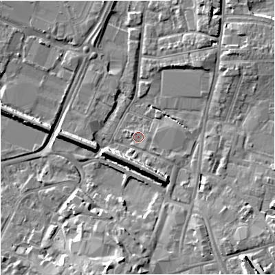 Shaded relief map of the ground around GL12SL, computed from Environment Agency LiDAR. The ground here sits at about 11 m above sea level and falls 12 m across the surrounding 800 m. Surface water reaching this point runs off ground lying to the south-east, 1.1 m higher.