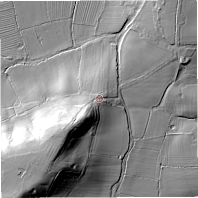 Shaded relief map of the ground around GL139LP, computed from Environment Agency LiDAR. The ground here sits at about 25 m above sea level and falls 44 m across the surrounding 800 m. Surface water reaching this point runs off ground lying to the south-west, 16.5 m higher.