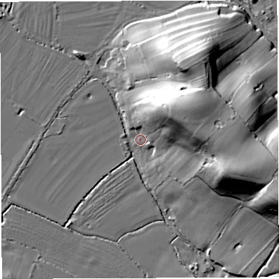Shaded relief map of the ground around GL139QX, computed from Environment Agency LiDAR. The ground here sits at about 9 m above sea level and falls 38 m across the surrounding 800 m. Surface water reaching this point runs off ground lying to the north-east, 30.4 m higher.