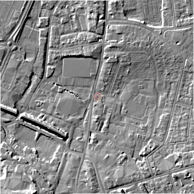 Shaded relief map of the ground around GL13AT, computed from Environment Agency LiDAR. The ground here sits at about 11 m above sea level and falls 10 m across the surrounding 800 m. Surface water reaching this point runs off ground lying to the south-east, 6.3 m higher.