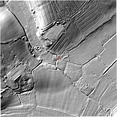 Shaded relief map of the ground around GL141RF, computed from Environment Agency LiDAR. The ground here sits at about 7 m above sea level and falls 15 m across the surrounding 800 m. Surface water reaching this point runs off ground lying to the north, 13.9 m higher.