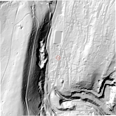 Shaded relief map of the ground around GL143AW, computed from Environment Agency LiDAR. The ground here sits at about 129 m above sea level and falls 113 m across the surrounding 800 m. Surface water reaching this point runs off ground lying to the east-north-east, 66.4 m higher.