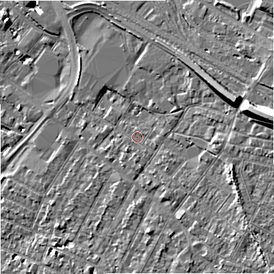 Shaded relief map of the ground around GL14AN, computed from Environment Agency LiDAR. The ground here sits at about 18 m above sea level and falls 15 m across the surrounding 800 m. Surface water reaching this point runs off ground lying to the south, 1.3 m higher.