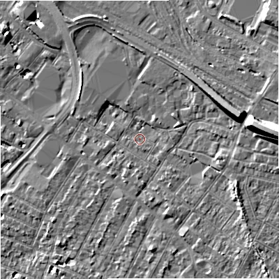Shaded relief map of the ground around GL14AT, computed from Environment Agency LiDAR. The ground here sits at about 18 m above sea level and falls 15 m across the surrounding 800 m. Surface water reaching this point runs off ground lying to the east, 12.2 m higher.