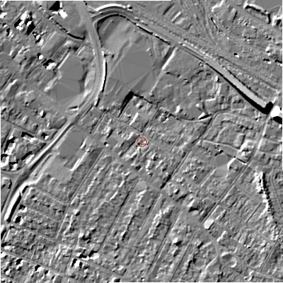 Shaded relief map of the ground around GL14AW, computed from Environment Agency LiDAR. The ground here sits at about 18 m above sea level and falls 15 m across the surrounding 800 m. Surface water reaching this point runs off ground lying to the south-east, 1.5 m higher.