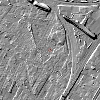 Shaded relief map of the ground around GL14DE, computed from Environment Agency LiDAR. The ground here sits at about 21 m above sea level and falls 14 m across the surrounding 800 m. Surface water reaching this point runs off ground lying to the south, 2.3 m higher.
