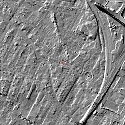 Shaded relief map of the ground around GL14DL, computed from Environment Agency LiDAR. The ground here sits at about 21 m above sea level and falls 14 m across the surrounding 800 m. Surface water reaching this point runs off ground lying to the south-east, 5.6 m higher.