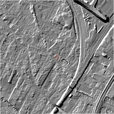Shaded relief map of the ground around GL14DW, computed from Environment Agency LiDAR. The ground here sits at about 22 m above sea level and falls 15 m across the surrounding 800 m. Surface water reaching this point runs off ground lying to the south-east, 5.2 m higher.