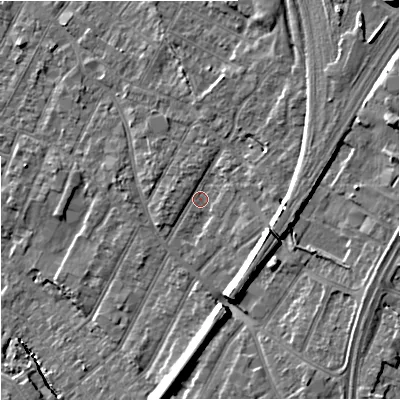 Shaded relief map of the ground around GL14LW, computed from Environment Agency LiDAR. The ground here sits at about 21 m above sea level and falls 14 m across the surrounding 800 m. Surface water reaching this point runs off ground lying to the east-north-east, 2.7 m higher.