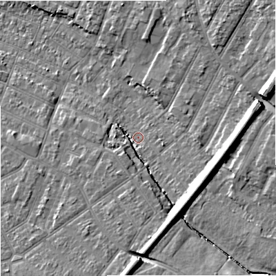 Shaded relief map of the ground around GL14NR, computed from Environment Agency LiDAR. The ground here sits at about 18 m above sea level and falls 12 m across the surrounding 800 m. Surface water reaching this point runs off ground lying to the south, 10.7 m higher.