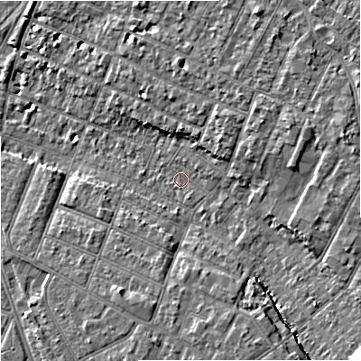 Shaded relief map of the ground around GL14SX, computed from Environment Agency LiDAR. The ground here sits at about 16 m above sea level and falls 13 m across the surrounding 800 m. Surface water reaching this point runs off ground lying to the south-east, 10.8 m higher.