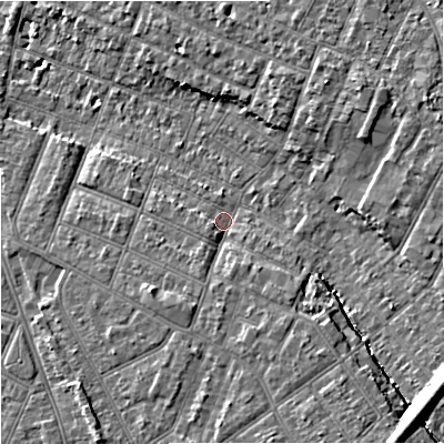 Shaded relief map of the ground around GL14TA, computed from Environment Agency LiDAR. The ground here sits at about 18 m above sea level and falls 14 m across the surrounding 800 m. Surface water reaching this point runs off ground lying to the south-east, 6.4 m higher.