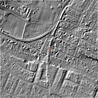Shaded relief map of the ground around GL14UD, computed from Environment Agency LiDAR. The ground here sits at about 14 m above sea level and falls 9 m across the surrounding 800 m. Surface water reaching this point runs off ground lying to the south-east, 6.8 m higher.