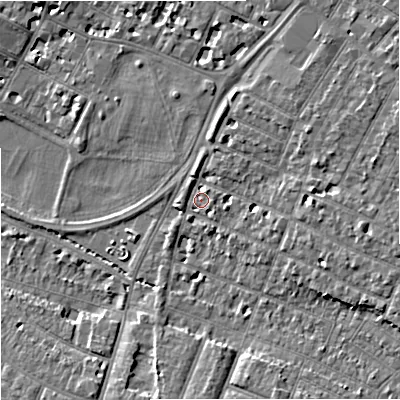 Shaded relief map of the ground around GL14UH, computed from Environment Agency LiDAR. The ground here sits at about 15 m above sea level and falls 7 m across the surrounding 800 m. Surface water reaching this point runs off ground lying to the east, 4.9 m higher.
