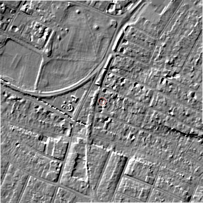 Shaded relief map of the ground around GL14UL, computed from Environment Agency LiDAR. The ground here sits at about 13 m above sea level and falls 8 m across the surrounding 800 m. Surface water reaching this point runs off ground lying to the south-east, 6.4 m higher.