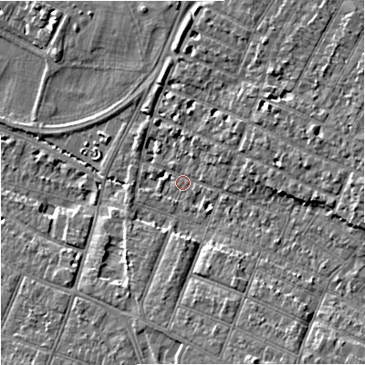 Shaded relief map of the ground around GL14UP, computed from Environment Agency LiDAR. The ground here sits at about 15 m above sea level and falls 9 m across the surrounding 800 m. Surface water reaching this point runs off ground lying to the south-south-east, 7.1 m higher.
