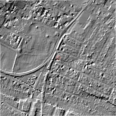 Shaded relief map of the ground around GL14UQ, computed from Environment Agency LiDAR. The ground here sits at about 16 m above sea level and falls 8 m across the surrounding 800 m. Surface water reaching this point runs off ground lying to the north-east, 2.2 m higher.