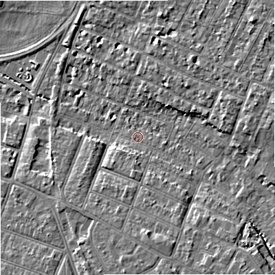 Shaded relief map of the ground around GL14UU, computed from Environment Agency LiDAR. The ground here sits at about 16 m above sea level and falls 10 m across the surrounding 800 m. Surface water reaching this point runs off ground lying to the south, 5.4 m higher.
