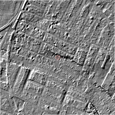Shaded relief map of the ground around GL14XA, computed from Environment Agency LiDAR. The ground here sits at about 16 m above sea level and falls 9 m across the surrounding 800 m. Surface water reaching this point runs off ground lying to the south-south-east, 6.0 m higher.