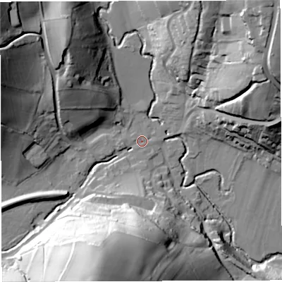 Shaded relief map of the ground around GL154DY, computed from Environment Agency LiDAR. The ground here sits at about 23 m above sea level and falls 61 m across the surrounding 800 m. Surface water reaching this point runs off ground lying to the south-south-west, 57.6 m higher.