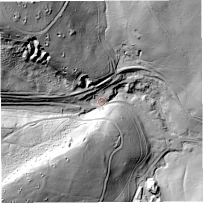 Shaded relief map of the ground around GL154JQ, computed from Environment Agency LiDAR. The ground here sits at about 70 m above sea level and falls 104 m across the surrounding 800 m. Surface water reaching this point runs off ground lying to the north-west, 84.3 m higher.