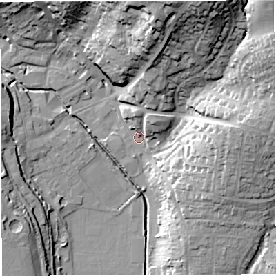 Shaded relief map of the ground around GL155PB, computed from Environment Agency LiDAR. The ground here sits at about 11 m above sea level and falls 38 m across the surrounding 800 m. Surface water reaching this point runs off ground lying to the north-east, 34.5 m higher.