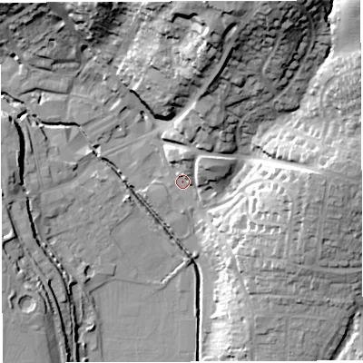 Shaded relief map of the ground around GL155PE, computed from Environment Agency LiDAR. The ground here sits at about 11 m above sea level and falls 38 m across the surrounding 800 m. Surface water reaching this point runs off ground lying to the north-north-east, 34.8 m higher.