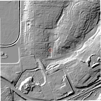 Shaded relief map of the ground around GL155PZ, computed from Environment Agency LiDAR. The ground here sits at about 11 m above sea level and falls 23 m across the surrounding 800 m. Surface water reaching this point runs off ground lying to the north-east, 20.9 m higher.