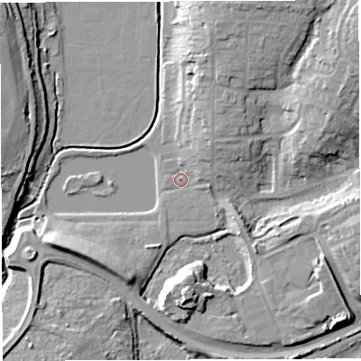 Shaded relief map of the ground around GL155RH, computed from Environment Agency LiDAR. The ground here sits at about 10 m above sea level and falls 17 m across the surrounding 800 m. Surface water reaching this point runs off ground lying to the north-north-east, 7.8 m higher.