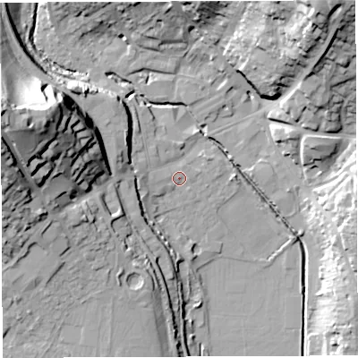 Shaded relief map of the ground around GL155RN, computed from Environment Agency LiDAR. The ground here sits at about 12 m above sea level and falls 40 m across the surrounding 800 m. Surface water reaching this point runs off ground lying to the west, 1.1 m higher.