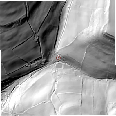 Shaded relief map of the ground around GL156QH, computed from Environment Agency LiDAR. The ground here sits at about 83 m above sea level and falls 139 m across the surrounding 800 m. Surface water reaching this point runs off ground lying to the east-north-east, 62.3 m higher.