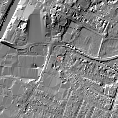 Shaded relief map of the ground around GL15AA, computed from Environment Agency LiDAR. The ground here sits at about 12 m above sea level and falls 7 m across the surrounding 800 m. Surface water reaching this point runs off ground lying to the south-east, 5.3 m higher.