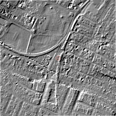 Shaded relief map of the ground around GL15AT, computed from Environment Agency LiDAR. The ground here sits at about 14 m above sea level and falls 8 m across the surrounding 800 m. Surface water reaching this point runs off ground lying to the south-east, 6.0 m higher.