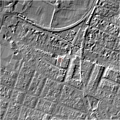 Shaded relief map of the ground around GL15BG, computed from Environment Agency LiDAR. The ground here sits at about 15 m above sea level and falls 10 m across the surrounding 800 m. Surface water reaching this point runs off ground lying to the south-south-east, 3.6 m higher.