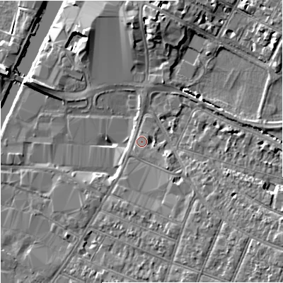 Shaded relief map of the ground around GL15BJ, computed from Environment Agency LiDAR. The ground here sits at about 12 m above sea level and falls 7 m across the surrounding 800 m. Surface water reaching this point runs off ground lying to the south-south-east, 2.4 m higher.