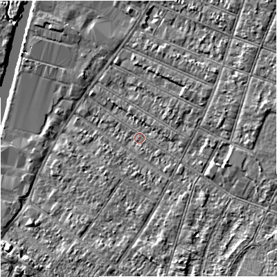 Shaded relief map of the ground around GL15HD, computed from Environment Agency LiDAR. The ground here sits at about 12 m above sea level and falls 6 m across the surrounding 800 m. Surface water reaching this point runs off ground lying to the south-east, 4.9 m higher.