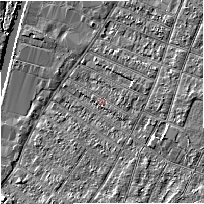 Shaded relief map of the ground around GL15QF, computed from Environment Agency LiDAR. The ground here sits at about 12 m above sea level and falls 6 m across the surrounding 800 m. Surface water reaching this point runs off ground lying to the east, 4.8 m higher.