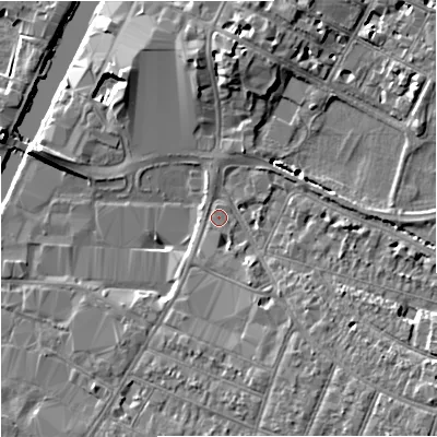 Shaded relief map of the ground around GL15RY, computed from Environment Agency LiDAR. The ground here sits at about 12 m above sea level and falls 7 m across the surrounding 800 m. Surface water reaching this point runs off ground lying to the south-east, 5.6 m higher.