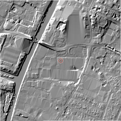 Shaded relief map of the ground around GL15SF, computed from Environment Agency LiDAR. The ground here sits at about 11 m above sea level and falls 7 m across the surrounding 800 m. The ground contributing surface water to this point lies to the south-west.