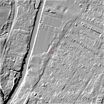 Shaded relief map of the ground around GL15TA, computed from Environment Agency LiDAR. The ground here sits at about 11 m above sea level and falls 8 m across the surrounding 800 m. Surface water reaching this point runs off ground lying to the south-south-west, 4.4 m higher.