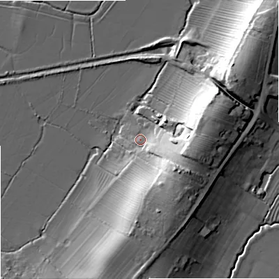 Shaded relief map of the ground around GL194AS, computed from Environment Agency LiDAR. The ground here sits at about 12 m above sea level and falls 23 m across the surrounding 800 m. Surface water reaching this point runs off ground lying to the south-east, 18.9 m higher.