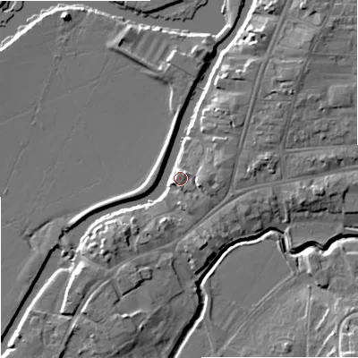 Shaded relief map of the ground around GL205AG, computed from Environment Agency LiDAR. The ground here sits at about 13 m above sea level and falls 10 m across the surrounding 800 m. Surface water reaching this point runs off ground lying to the east-north-east, 6.4 m higher.