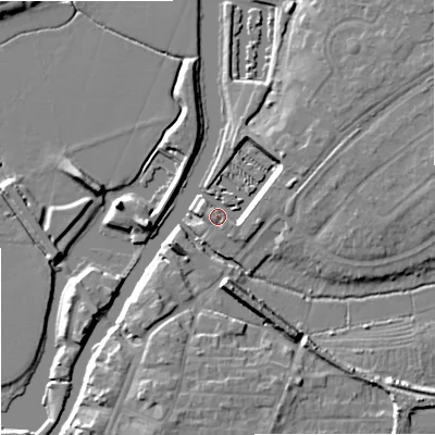 Shaded relief map of the ground around GL205AZ, computed from Environment Agency LiDAR. The ground here sits at about 13 m above sea level and falls 9 m across the surrounding 800 m. Surface water reaching this point runs off ground lying to the north-east, 5.6 m higher.