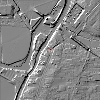 Shaded relief map of the ground around GL205BS, computed from Environment Agency LiDAR. The ground here sits at about 13 m above sea level and falls 10 m across the surrounding 800 m. Surface water reaching this point runs off ground lying to the south-south-east, 4.9 m higher.