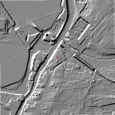 Shaded relief map of the ground around GL205BT, computed from Environment Agency LiDAR. The ground here sits at about 13 m above sea level and falls 9 m across the surrounding 800 m. Surface water reaching this point runs off ground lying to the south, 1.9 m higher.