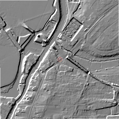 Shaded relief map of the ground around GL205BU, computed from Environment Agency LiDAR. The ground here sits at about 12 m above sea level and falls 9 m across the surrounding 800 m. Surface water reaching this point runs off ground lying to the east, 7.1 m higher.